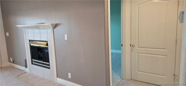 unfurnished living room featuring light carpet