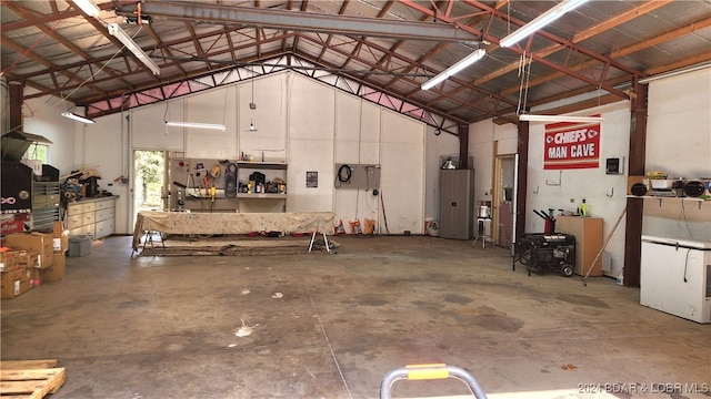 garage with a workshop area