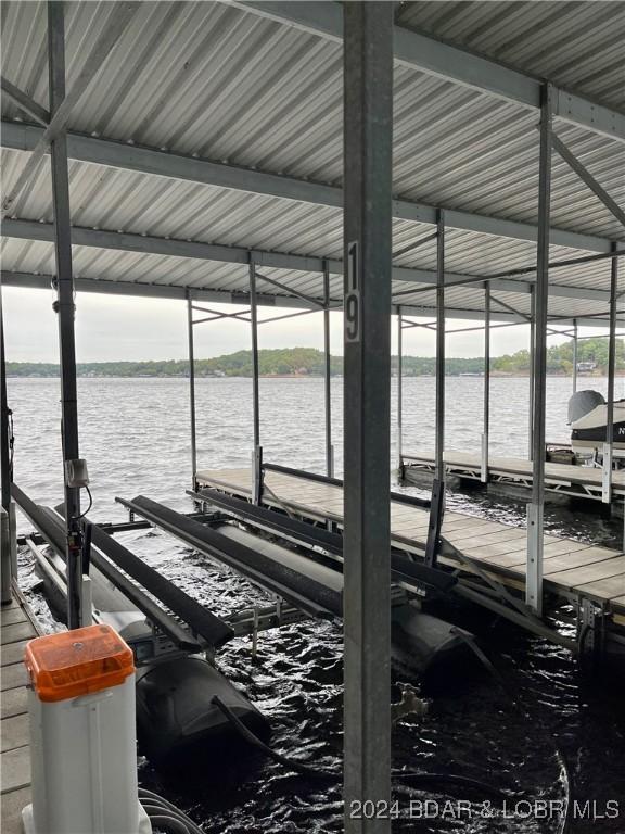 dock area featuring a water view