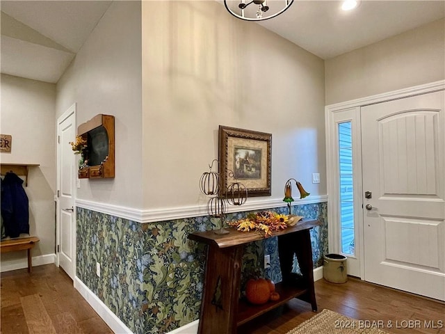 foyer with dark hardwood / wood-style floors