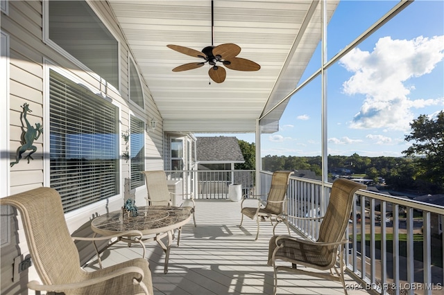 wooden deck with ceiling fan