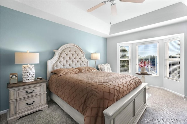 959 High St, Osage Beach, MO 65065 - bedroom featuring baseboards, a ceiling fan, and light colored carpet