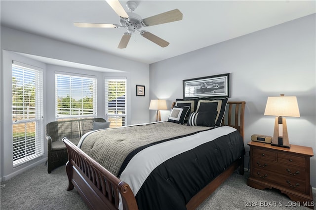 bedroom with ceiling fan and carpet floors