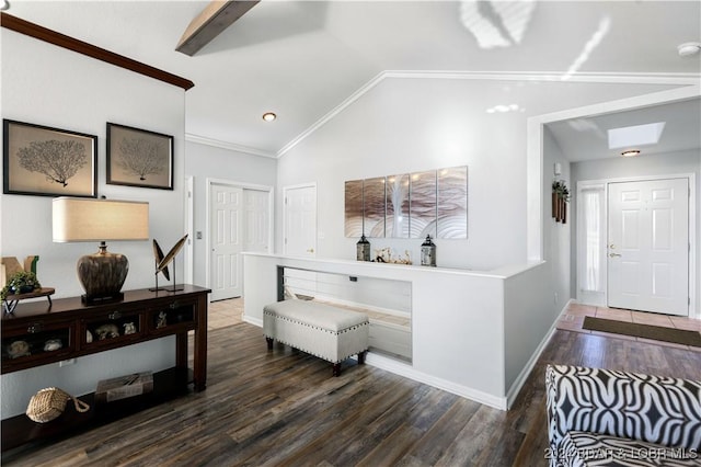 959 High St, Osage Beach, MO 65065 - interior space featuring baseboards, wood finished floors, vaulted ceiling with skylight, and crown molding
