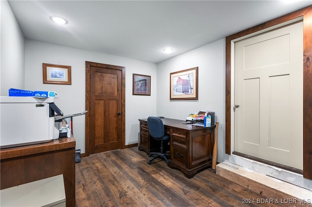 office space with dark wood-type flooring