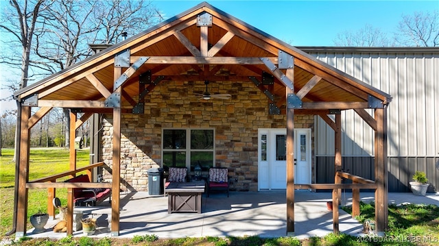 back of house with a yard and a patio area