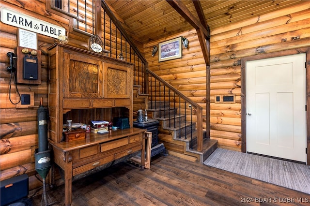 home office featuring wood-type flooring, wooden ceiling, rustic walls, high vaulted ceiling, and beamed ceiling