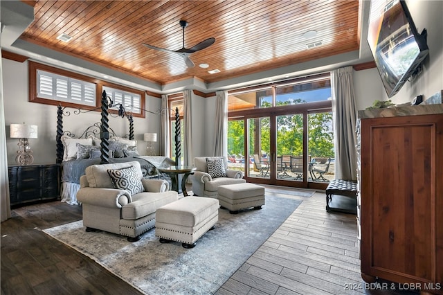 bedroom featuring hardwood / wood-style flooring, ceiling fan, access to exterior, and wood ceiling