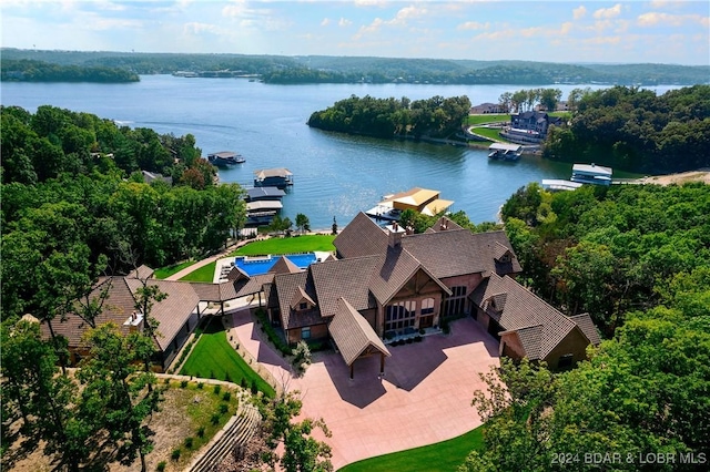 birds eye view of property featuring a water view