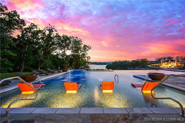 25 Springridge Ln, Villages, MO 65079 - view of swimming pool with an infinity pool and a water view