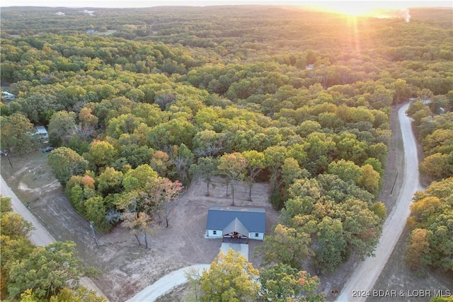 aerial view featuring a view of trees