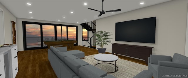 living room with ceiling fan and dark hardwood / wood-style flooring