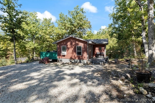 view of home's exterior with cooling unit