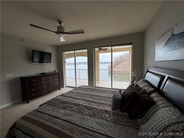 carpeted bedroom with ceiling fan and access to exterior