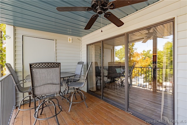 wooden terrace with ceiling fan