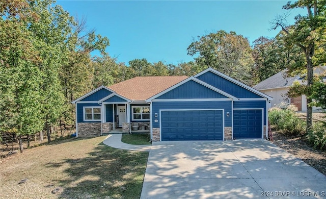 craftsman-style home featuring a garage