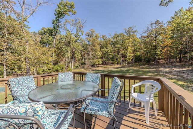 deck featuring a lawn