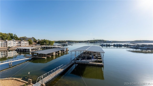 dock area featuring a water view