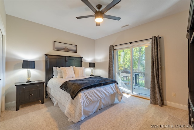 carpeted bedroom featuring ceiling fan and access to outside