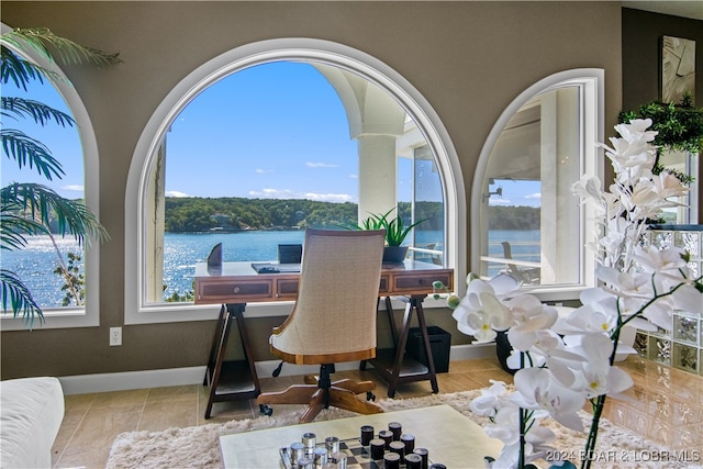 tiled home office with a water view