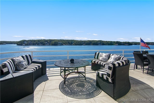 view of patio / terrace with a water view