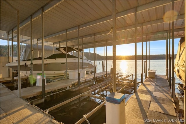 view of dock featuring a water view and boat lift