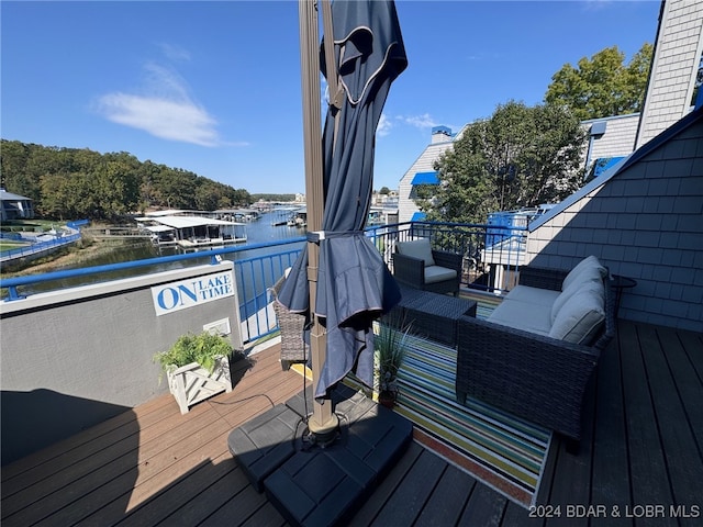 deck featuring a water view