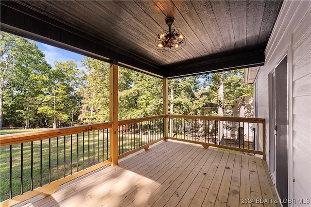 wooden deck with a yard