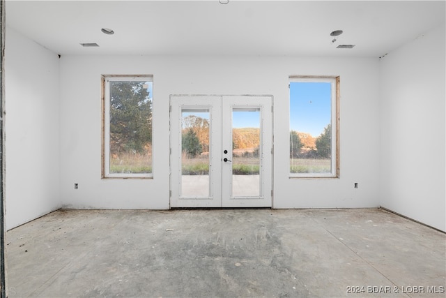 empty room featuring french doors