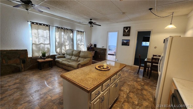 living room featuring ceiling fan