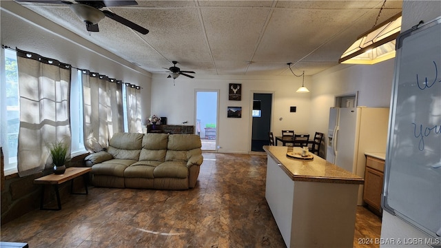 living room with ceiling fan