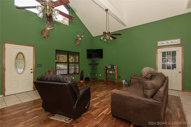 living room with ceiling fan and wood-type flooring