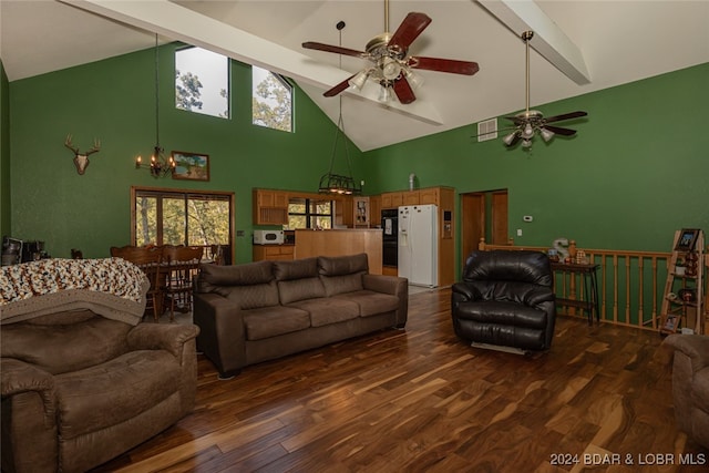 living room featuring beamed ceiling, dark wood-type flooring, high vaulted ceiling, and a wealth of natural light