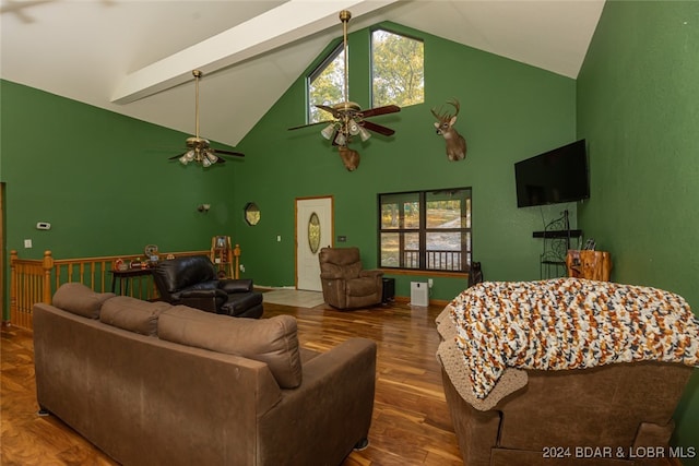 living room with high vaulted ceiling, beam ceiling, hardwood / wood-style flooring, and ceiling fan