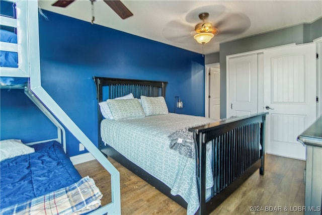 bedroom featuring ceiling fan and wood-type flooring