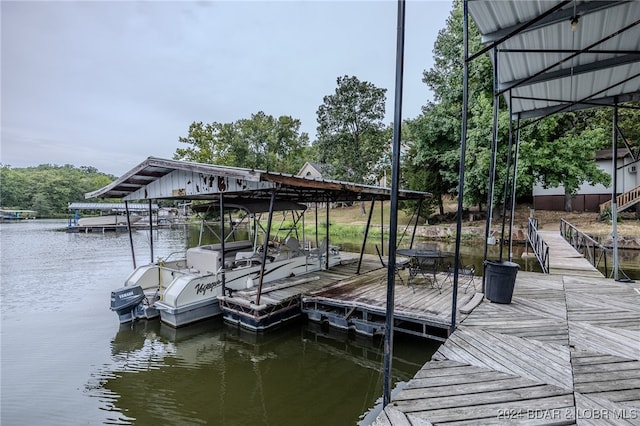 view of dock with a water view