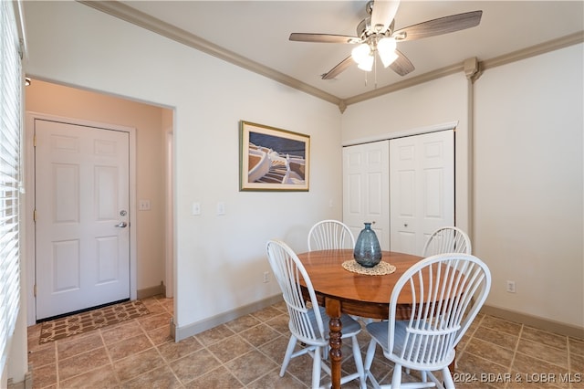 dining room with ornamental molding and ceiling fan