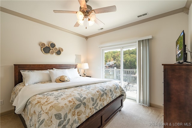 carpeted bedroom with ornamental molding, access to exterior, and ceiling fan