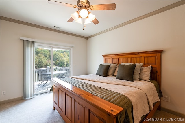 carpeted bedroom featuring access to outside, ornamental molding, and ceiling fan