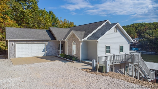 ranch-style house featuring a garage