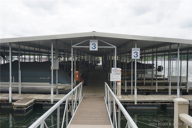 view of dock with a water view