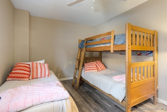 bedroom featuring hardwood / wood-style flooring and ceiling fan