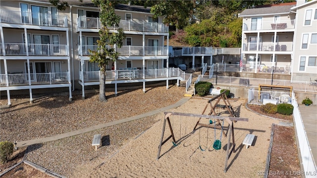 view of property's community featuring a playground