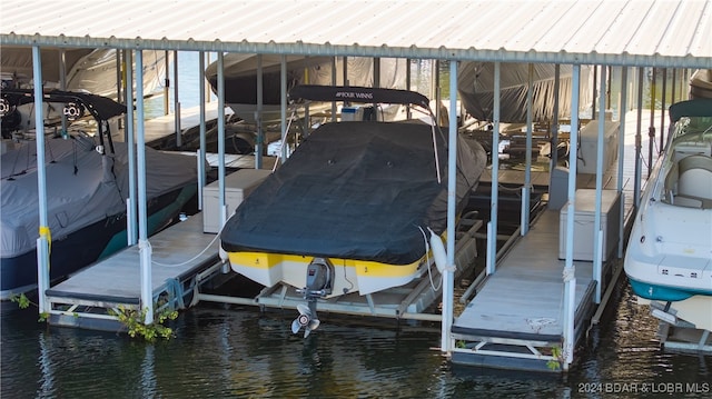 view of dock with a water view