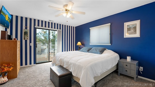 carpeted bedroom featuring access to exterior and ceiling fan