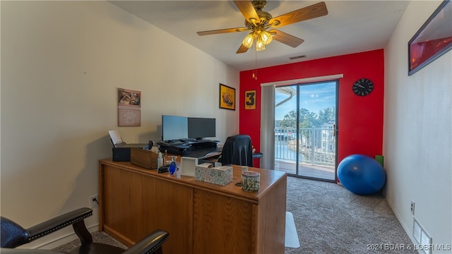 office space with ceiling fan and carpet flooring