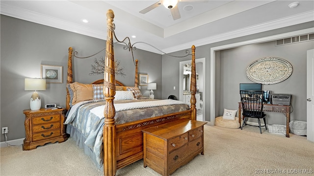 carpeted bedroom featuring ceiling fan and crown molding