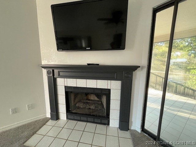 interior details with carpet and a fireplace