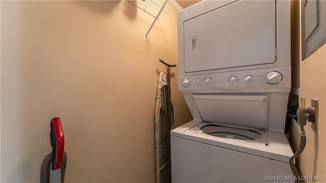 laundry area with laundry area and stacked washing maching and dryer