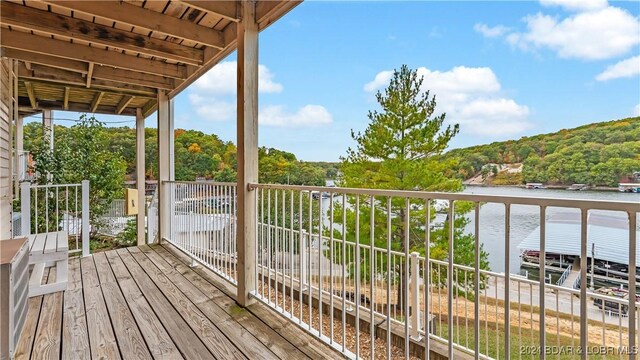 deck featuring a water view